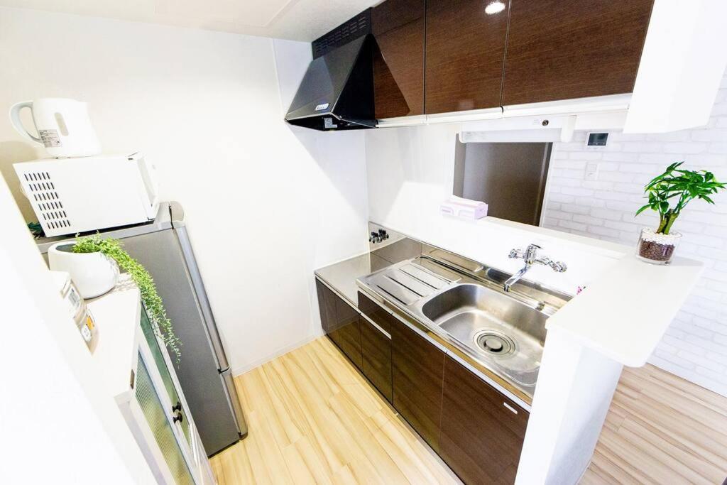 Eve Appartement Sapporo Buitenkant foto
